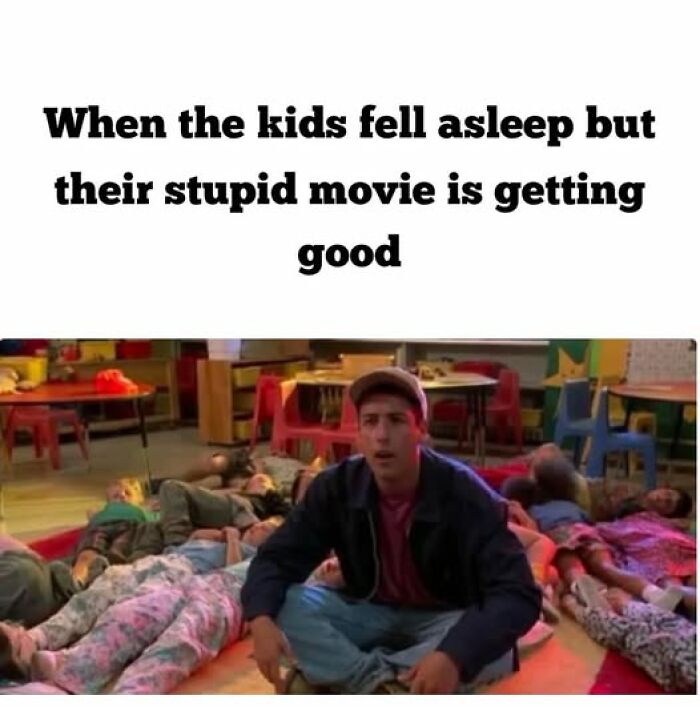 Man sitting in a room while kids sleep, with text about enjoying a movie. Parenting memes humor.