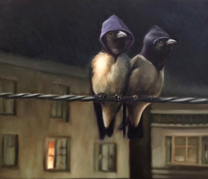 Two birds in hoodies perched on a wire, an example of anthropomorphic artwork by Richard Ahnert.
