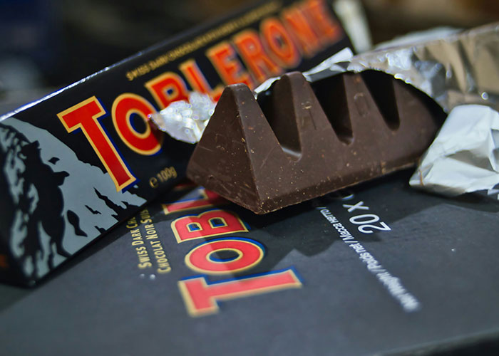 Toblerone chocolate bar, once an exotic food, partially unwrapped.