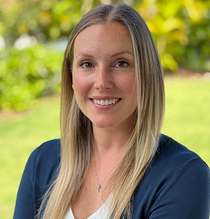 Smiling woman outdoors, linked to top doctor and Hawaii beauty spot incident. Smiling woman outdoors, linked to top doctor and Hawaii beauty spot incident.