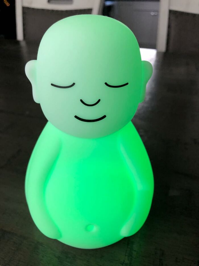 Smiling green Buddha night light from small businesses on Amazon.