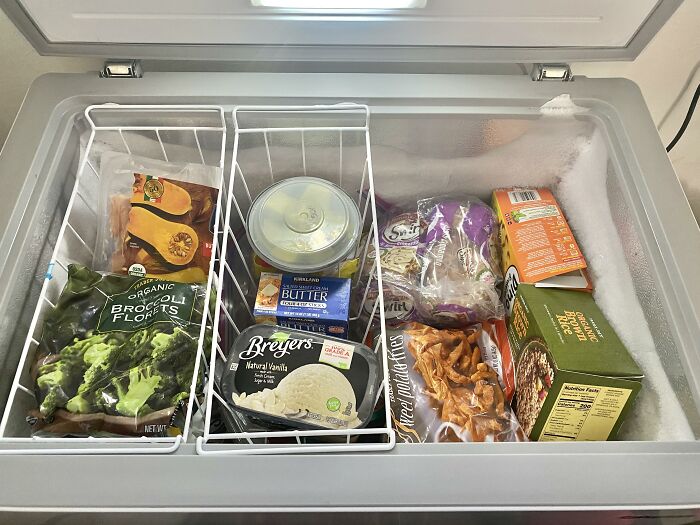 Open freezer filled with assorted groceries, showcasing items that had a huge impact on everyday life.