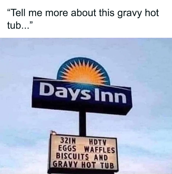 Days Inn sign with humorous mention of "gravy hot tub" alongside food-related advertising.