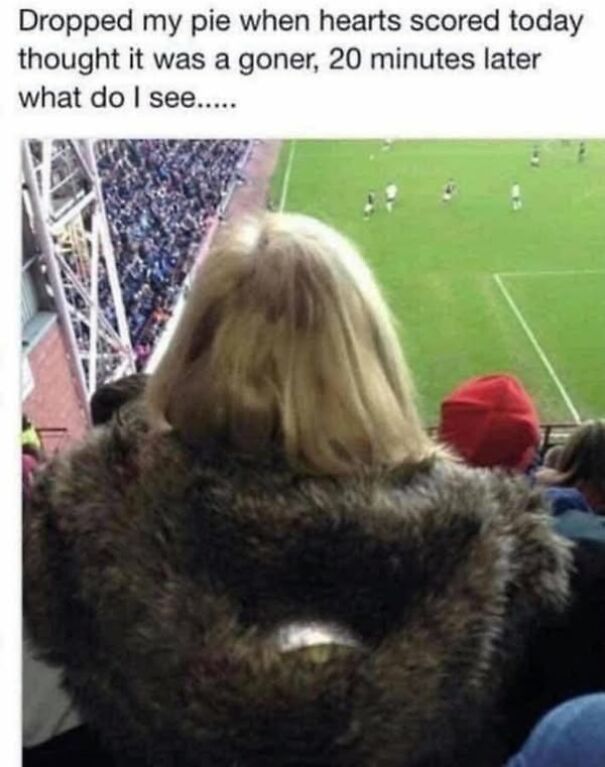 Scottish humor at a soccer match: A pie lands perfectly on a fur coat after being dropped.