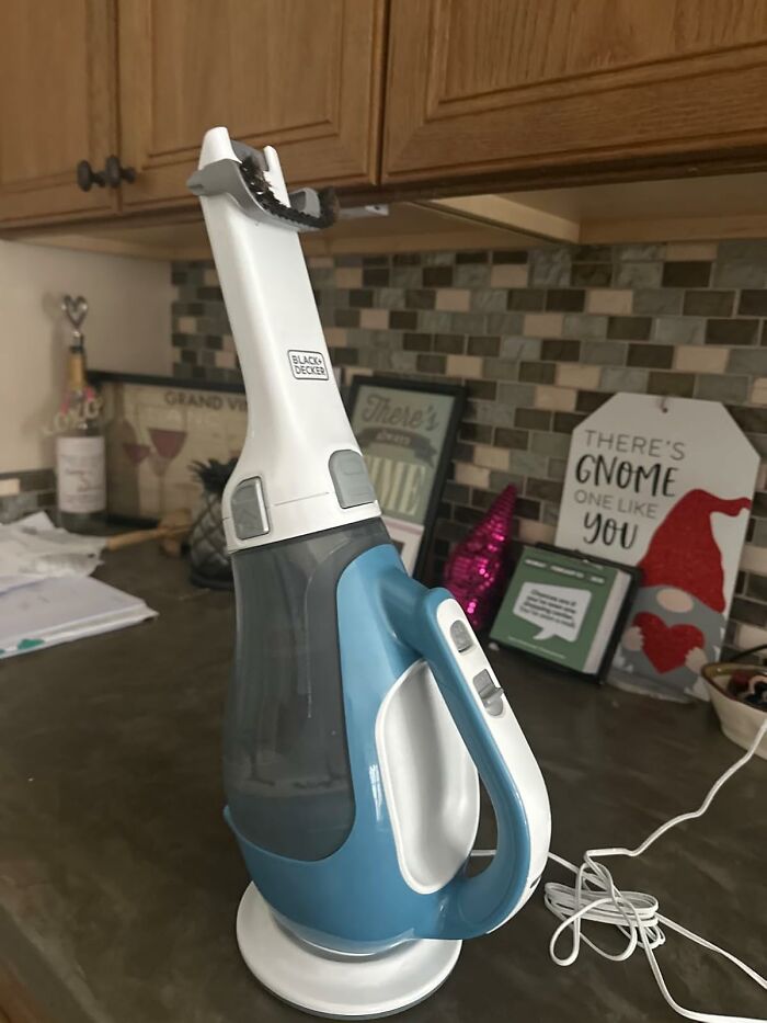 Handheld vacuum cleaner on kitchen counter, part of Amazon spring deals.