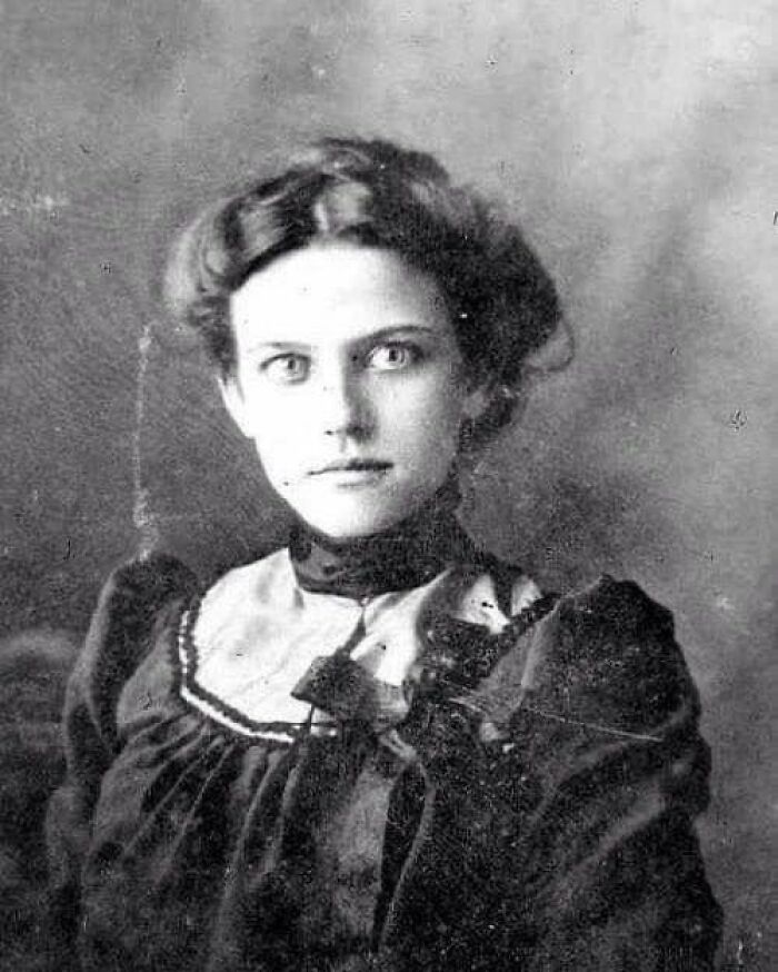 Vintage portrait of a woman with curly hair and Victorian attire, representing lesser-known historical moments.