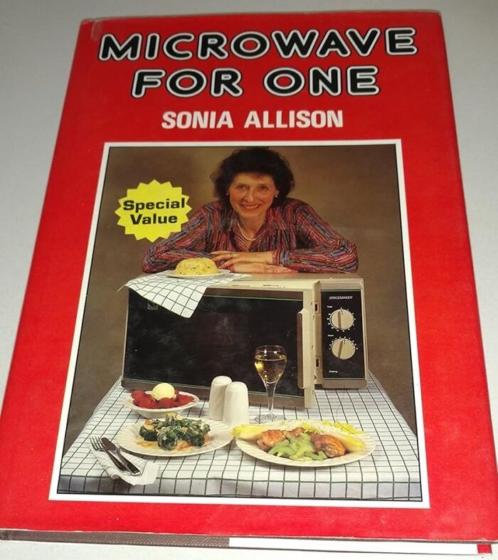 Cookbook "Microwave for One" displayed, featuring single-serving meals and a smiling woman on the cover.