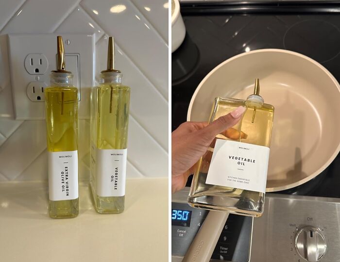 Two oil dispensers labeled "Extra Virgin Olive Oil" and "Vegetable Oil" by a stove, enhancing a problem-free kitchen.