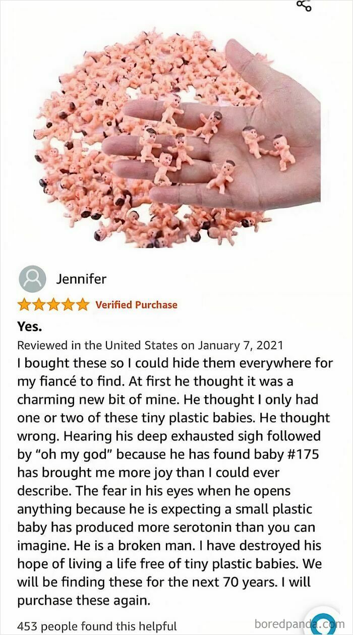 Hand holding tiny plastic babies, with a humorous Amazon review about hiding them everywhere as a playful prank on a fiancé.
