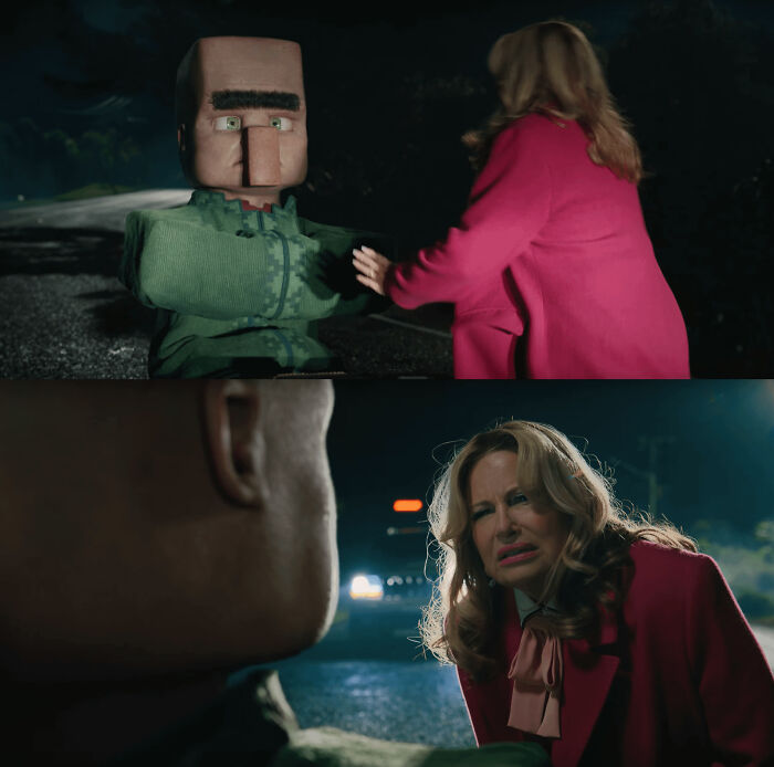 Woman in a pink coat confronting a large puppet character in a dark outdoor scene with questionable movie details.