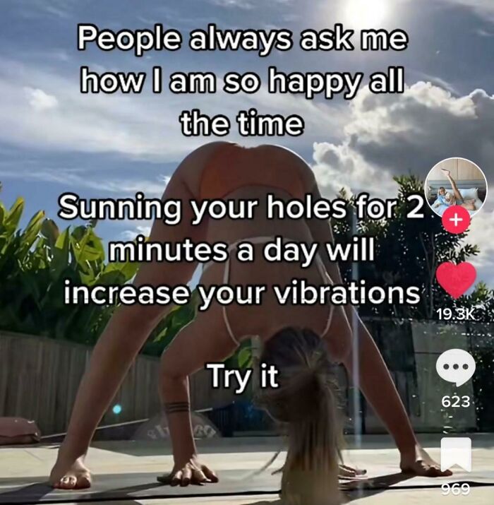 Influencer outdoors, practicing unconventional sunning technique, promoting happiness and wellness in a social media post.