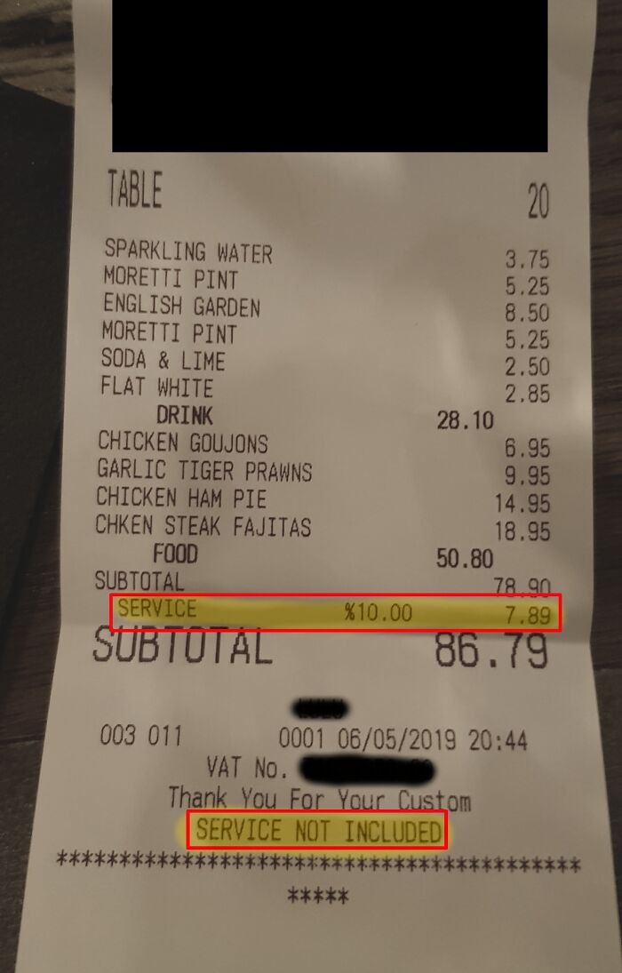 Receipt showing service charge and note stating service not included.