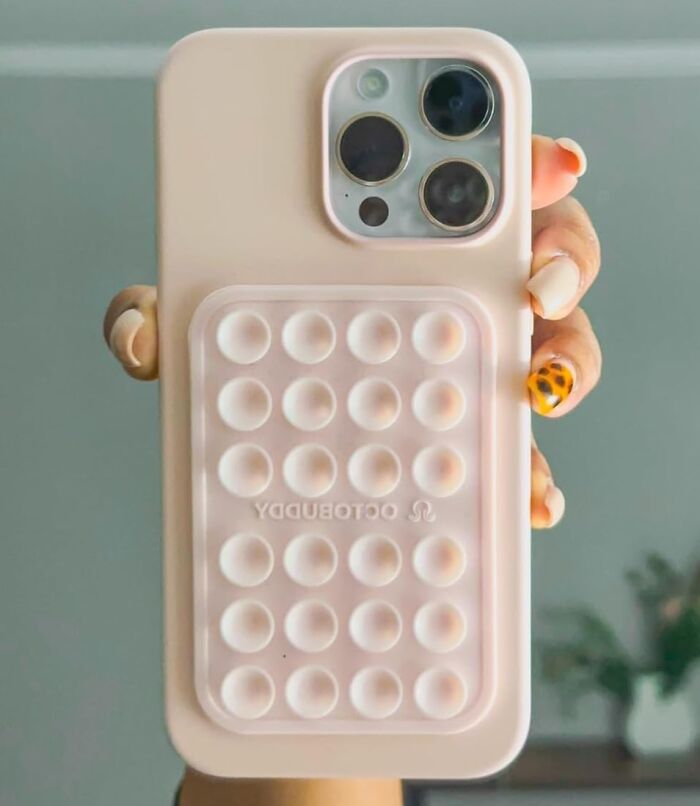 Phone case with textured grip held in hand; a cheap fix for phone safety issues.