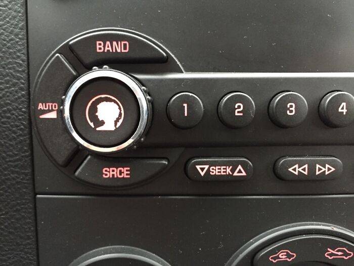 Old car radio buttons, showcasing things used over time, with band and seek options.