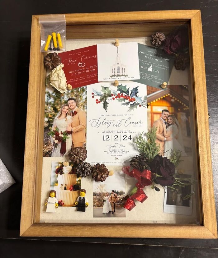 Shadow box displaying sentimental clutter, including wedding photos, invitations, and small mementos.