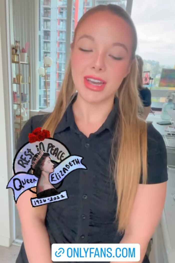 Entitled influencer wearing black with OnlyFans logo.