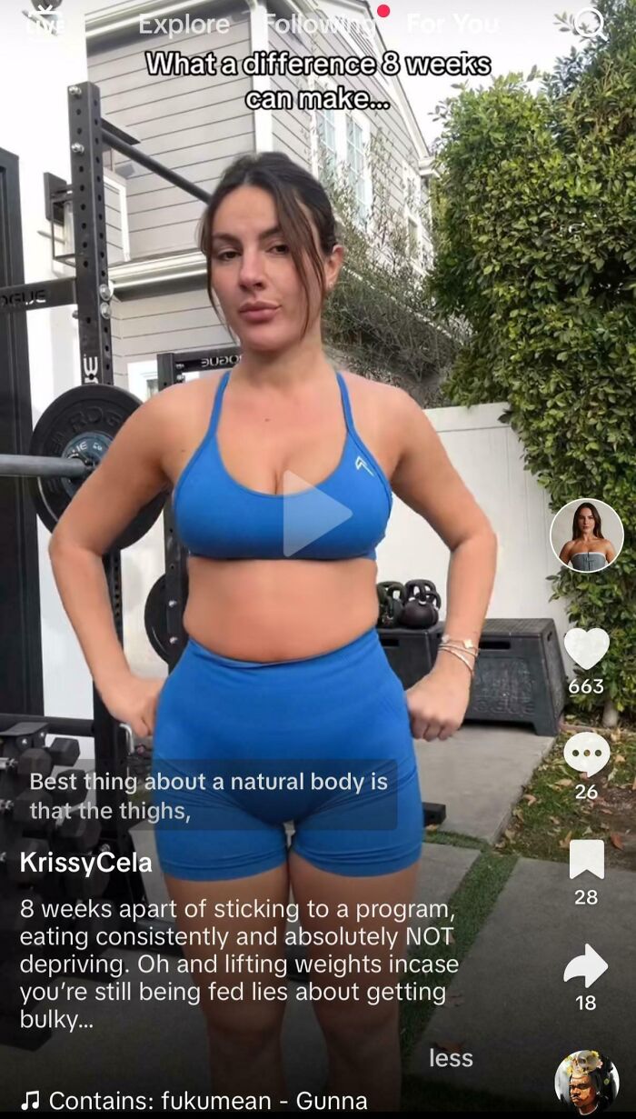 Woman in blue workout outfit promotes fitness progress amid influencer culture outside a building.