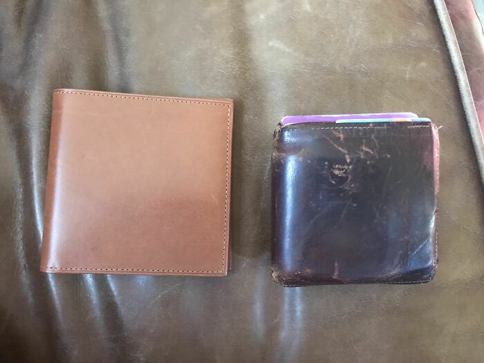 Two leather wallets, one new and one aged, illustrating things used over time.