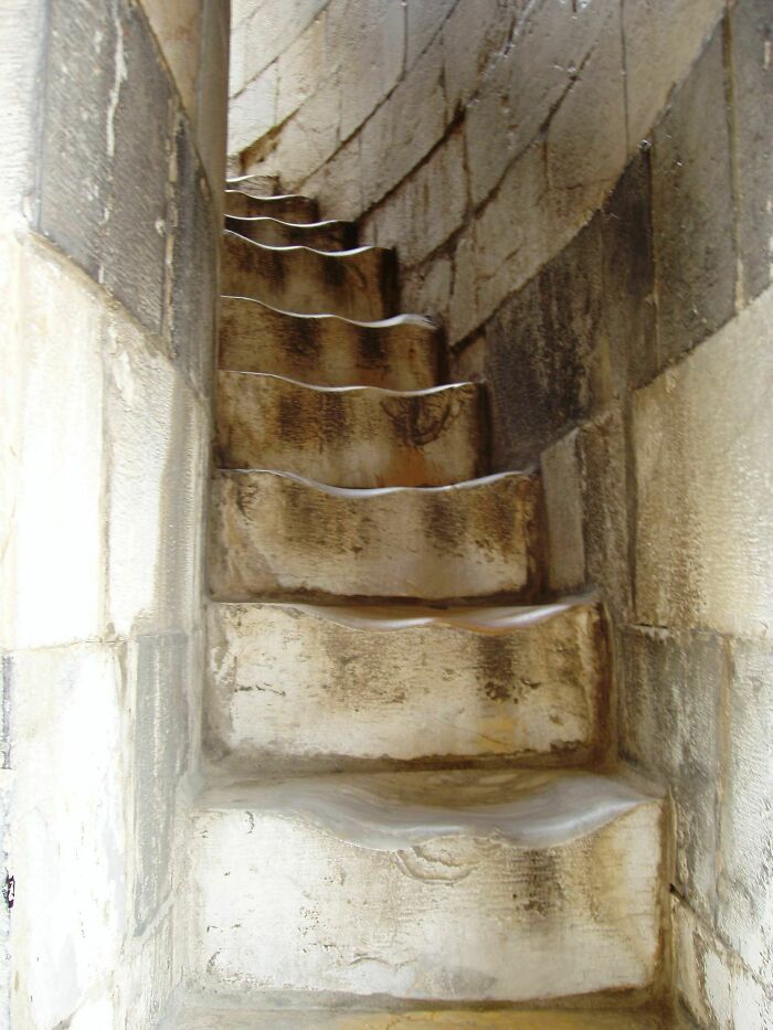 Worn stone steps showing erosion, illustrating things used over time.