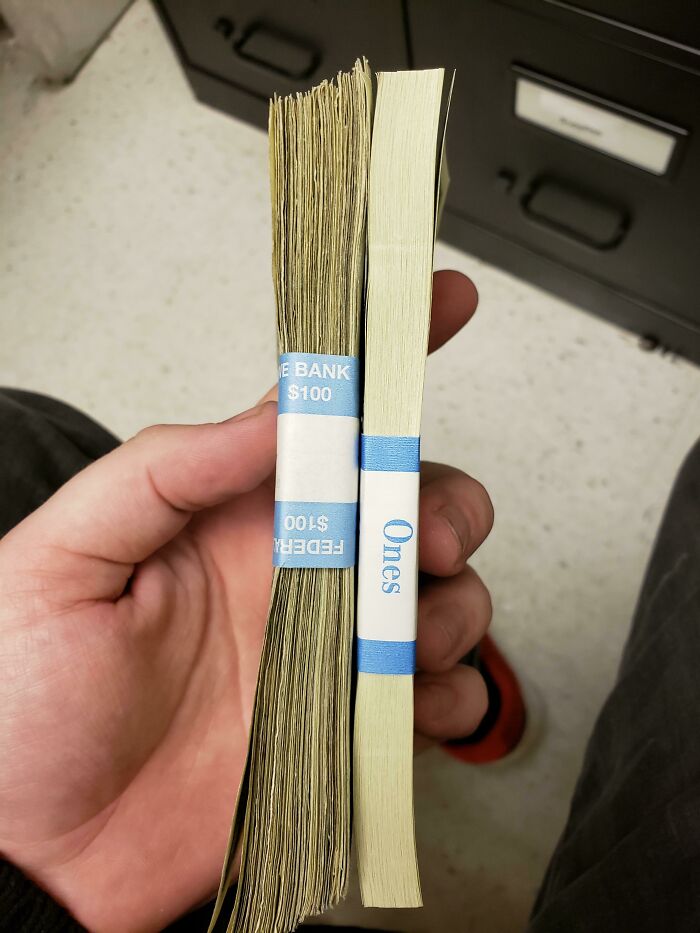 Hand holding two stacks of $1 bills labeled "Value" and "Ones," highlighting time vs. things concept.