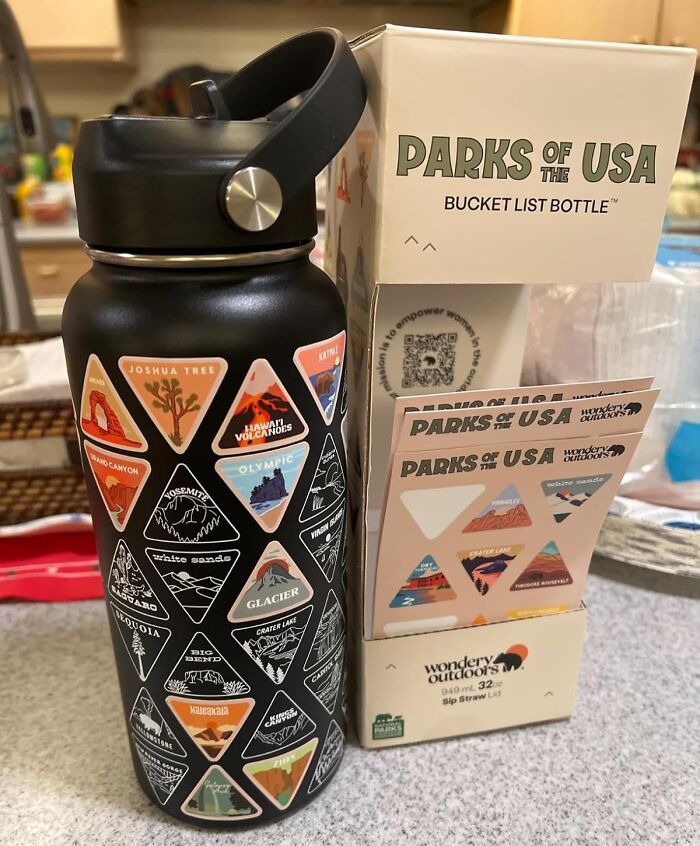 Water bottle with national park stickers, promoting digital detox through outdoor adventures.