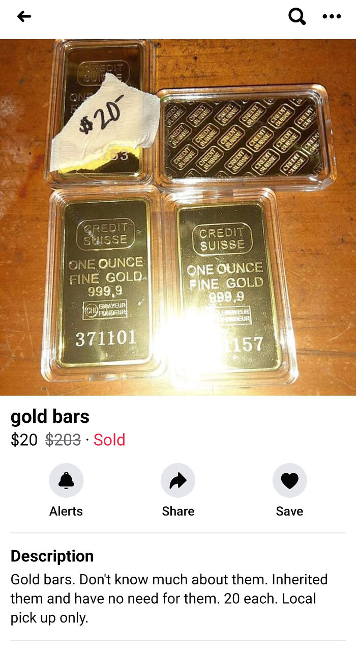 Gold bars priced at $20 each with a note, emphasizing a scam-like deal on a wooden surface.