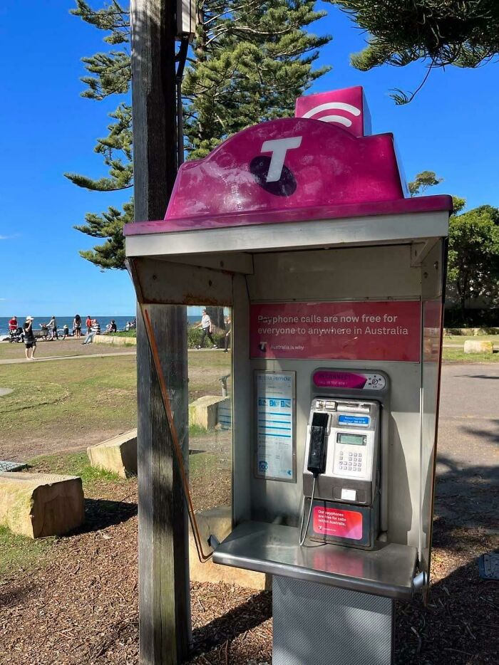 Free public payphone in Australia, showcasing a unique way the country cares for its citizens.