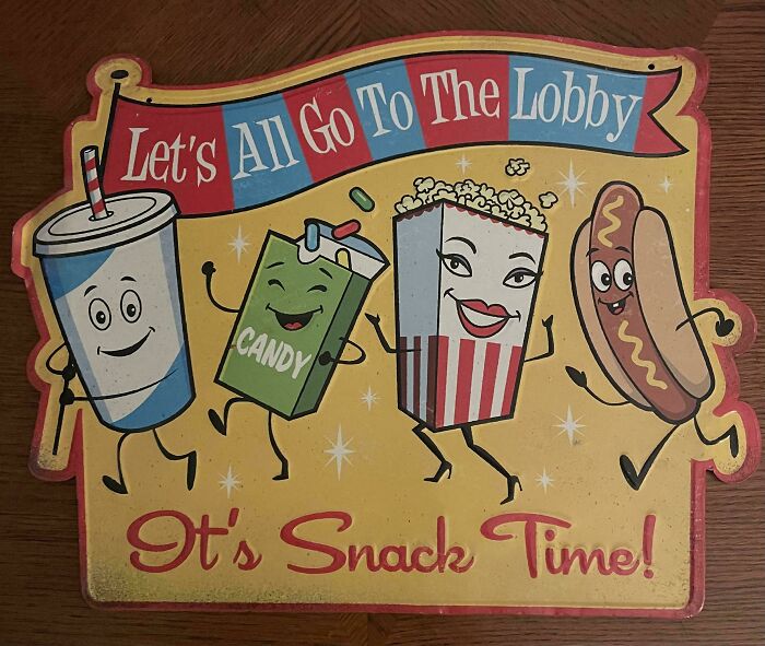 Vintage movie snack sign with animated popcorn, hotdog, candy, and drink, evoking nostalgic pics and memories of getting old.