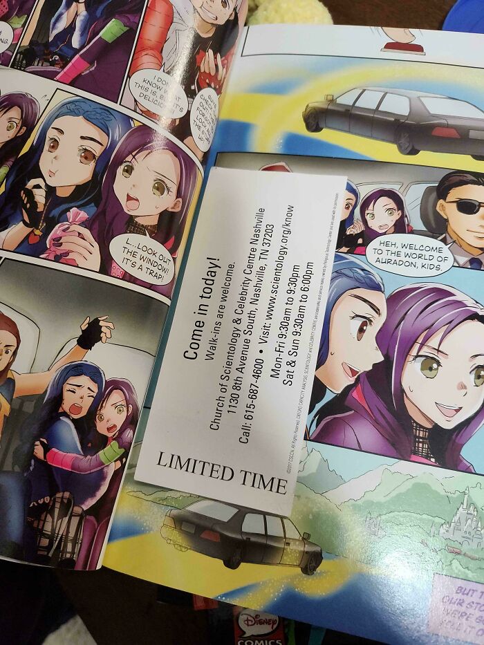 Unique bookmark placed inside a colorful comic book, showcasing anime characters with a printed flyer.