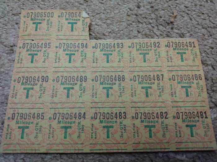 Unique bookmarks made from vintage mileage tickets on a textured surface.