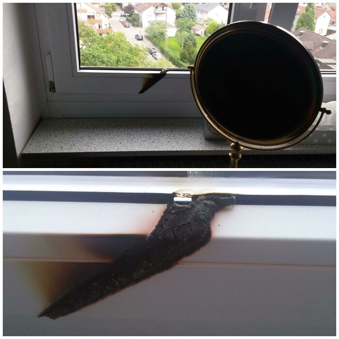 Burnt window sill caused by a magnifying mirror accident, illustrating a costly mishap.