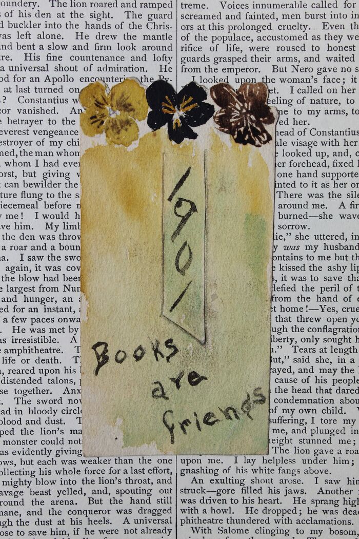 Colorful bookmark with "Books are friends" on a vintage page.