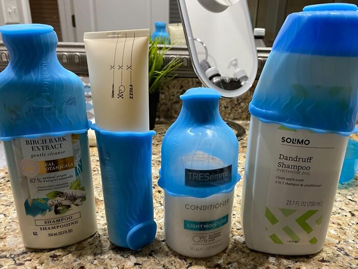 Travel hacks: inverted bottles on a bathroom counter to use every last drop.