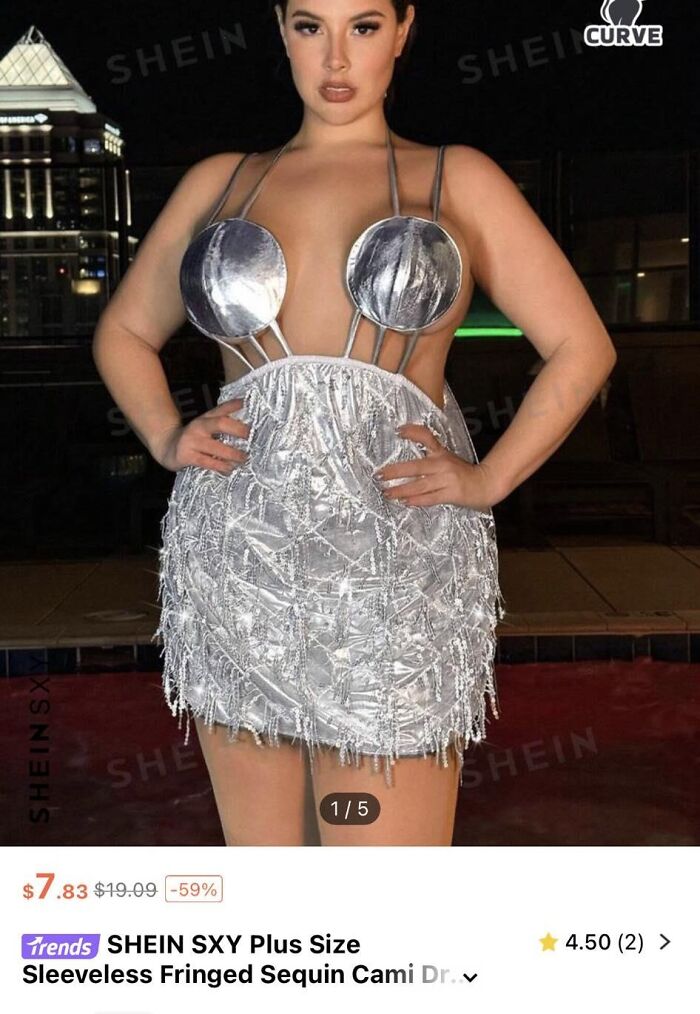 Woman in a sleeveless fringed sequin cami dress, showcasing a bold fashion choice.