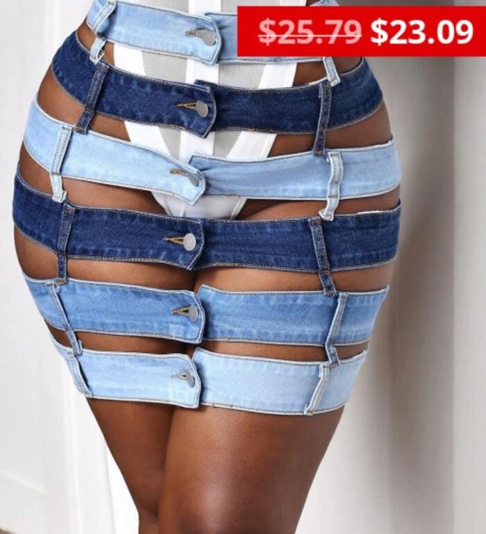Denim fashion disaster featuring multiple straps and buttons at a discounted price.