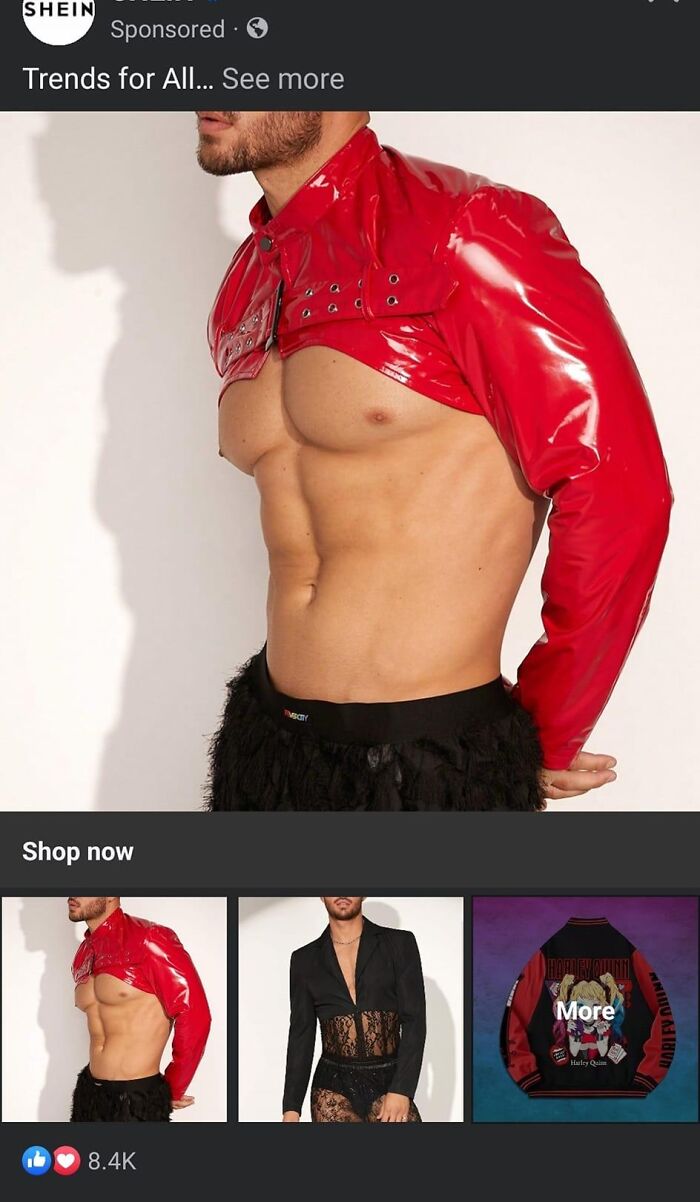 Man wearing a shiny red cropped jacket with black textured pants, showcasing a fashion disaster from Facebook.