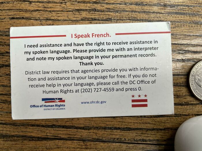 Card offering language assistance in French, showcasing how countries take care of their citizens' communication needs.