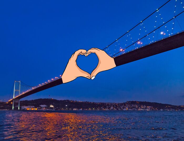 Illustration of hands forming a heart with a scenic bridge as backdrop, a creative artwork by Robin Yayla.