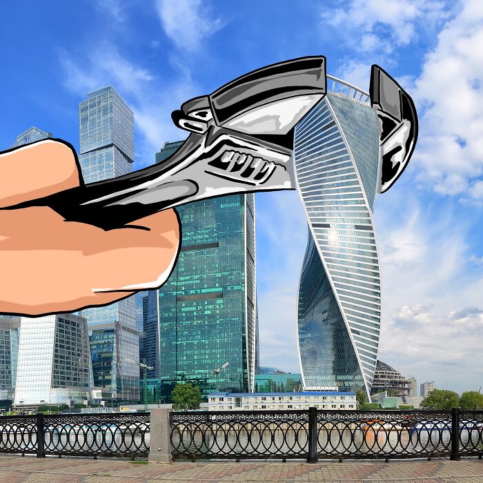 Creative illustration of a giant hand with a wrench in front of skyscrapers, drawn on a scenic city photo.