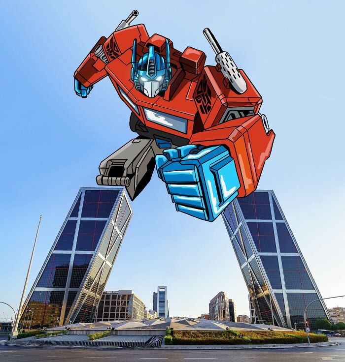Creative illustration of a red robot drawn over scenic cityscape with two modern skyscrapers.