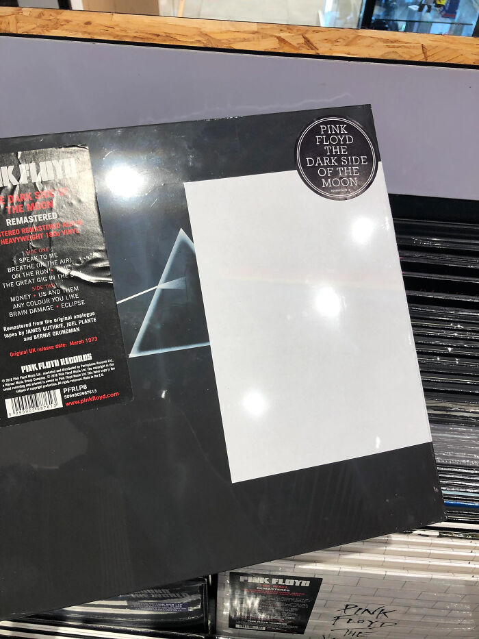 Pink Floyd's "The Dark Side of the Moon" album with a printing error, showcasing an unusual record cover. Only-In-Dubai appeal.