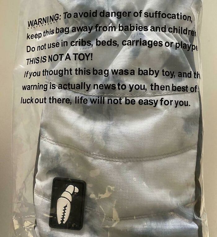 Plastic bag with humorous passive-aggressive warning about suffocation risk and life difficulties.