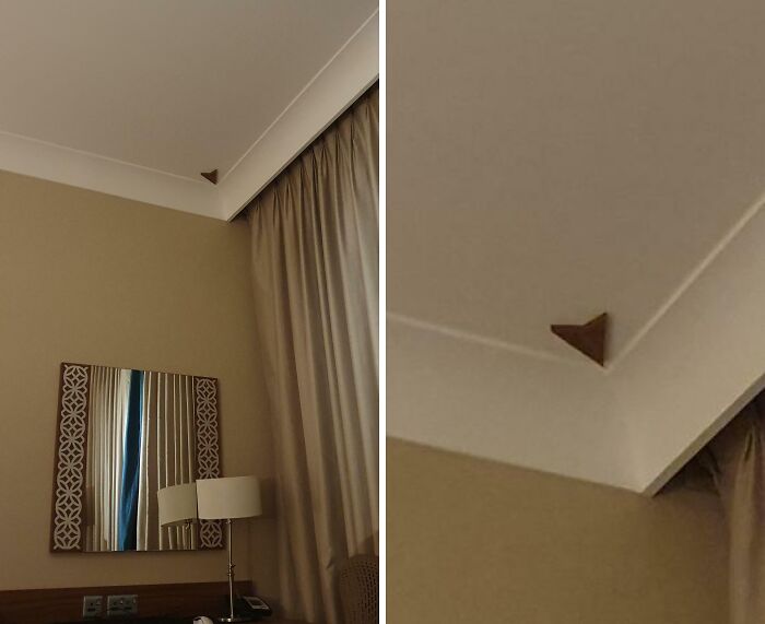 Ceiling corner with a brown triangle detail in a hotel room, showcasing Only-In-Dubai-Photos uniqueness.