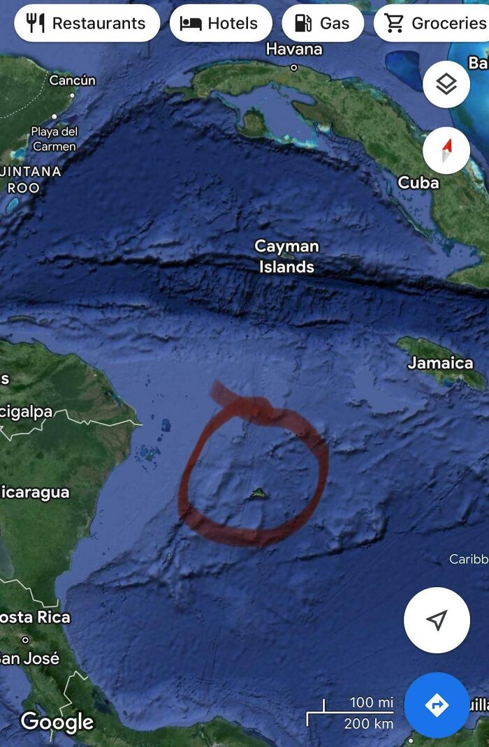 Strange red circle found on Google Earth near Cayman Islands.
