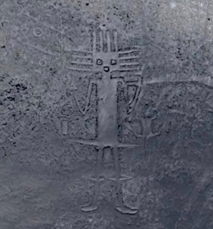 Strange geoglyph found on Google Earth resembling a humanoid figure in a desert landscape.