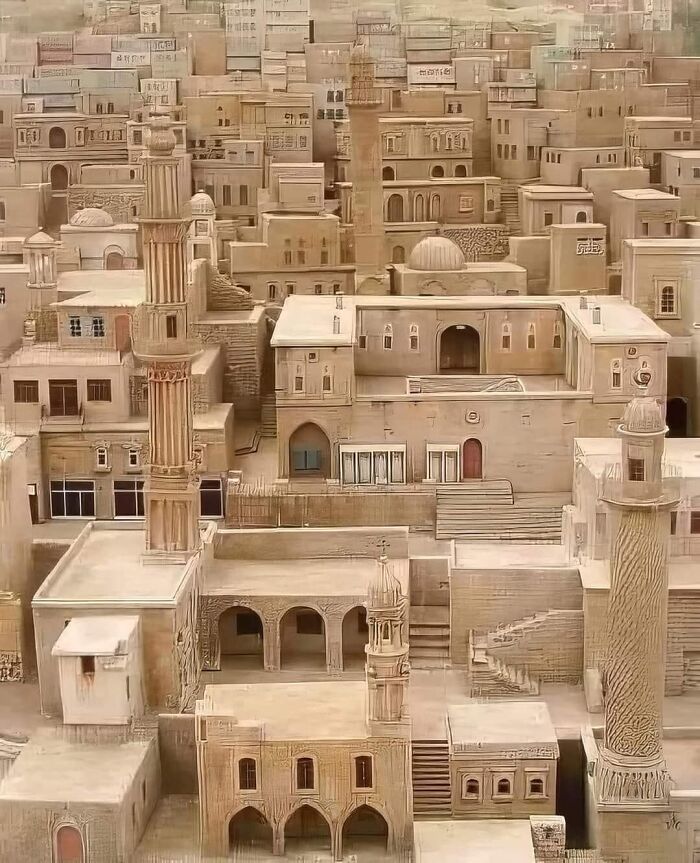 Ancient explorers' cityscape model showcasing detailed architectural features of historic structures.