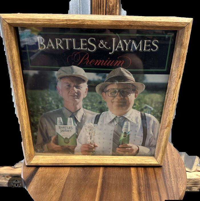 Framed nostalgic Bartles & Jaymes vintage advertisement featuring two men holding drinks, evoking a sense of being old now.