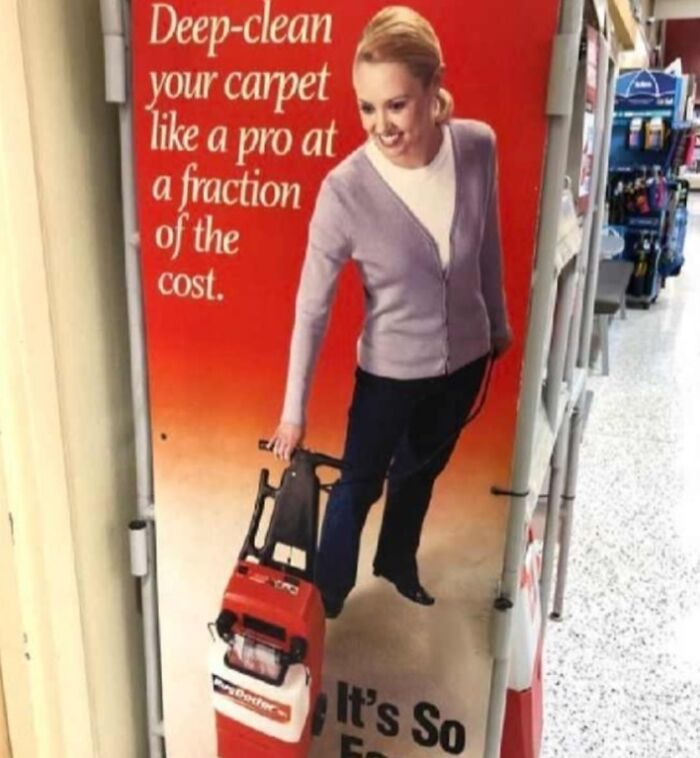 Woman on a poster using a carpet cleaner, promoting cost-effective deep cleaning. Quirky ad in a retail setting.