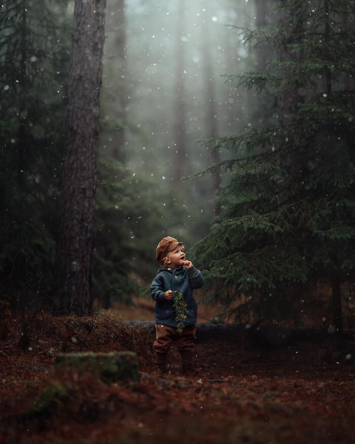 Child exploring a magical forest, capturing the essence of childhood through a mother's lens.
