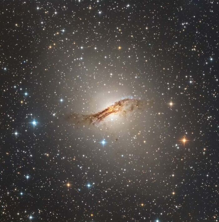 Astrophotography shot of a galaxy with glowing stars scattered across the night sky, captured by Soumyadeep Mukherjee.